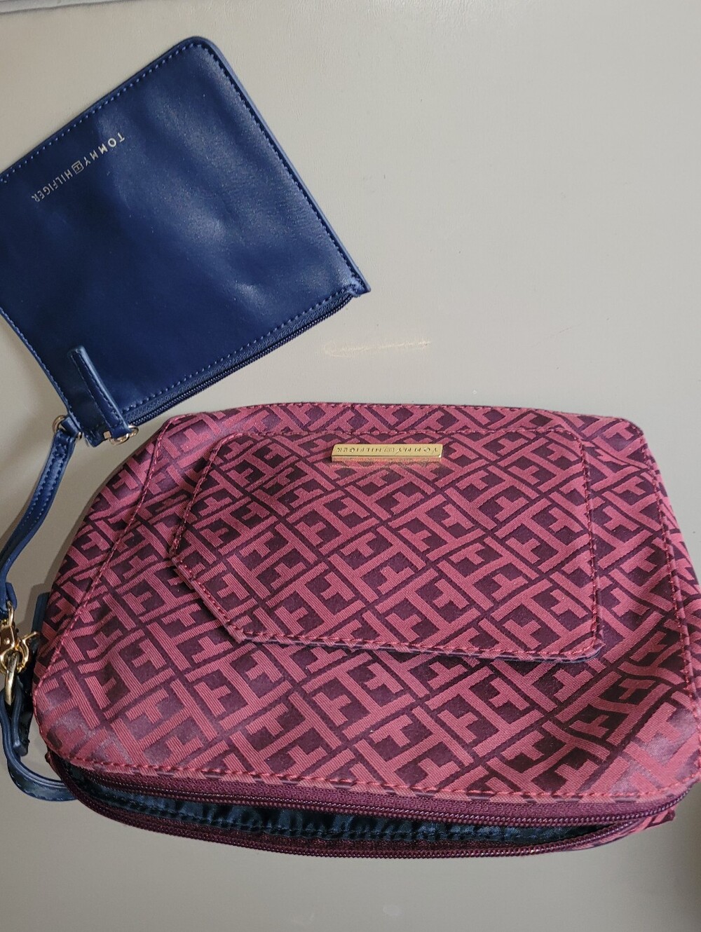 Tommy Hilfiger Brick logo jacquard fabric Crossbody and Blue Wristlet.